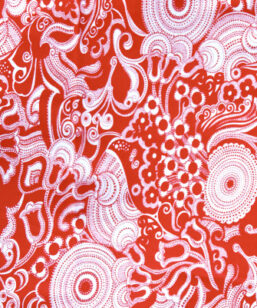Bilden visar Retrotyg - Mjuk röd bomullsjersey blommor och paisley detalj mönster